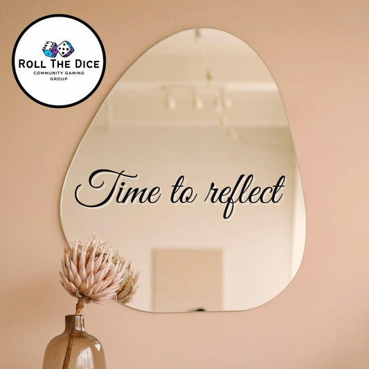 Reflections in a stylish mirror with the phrase 'Time to reflect' displayed prominently.